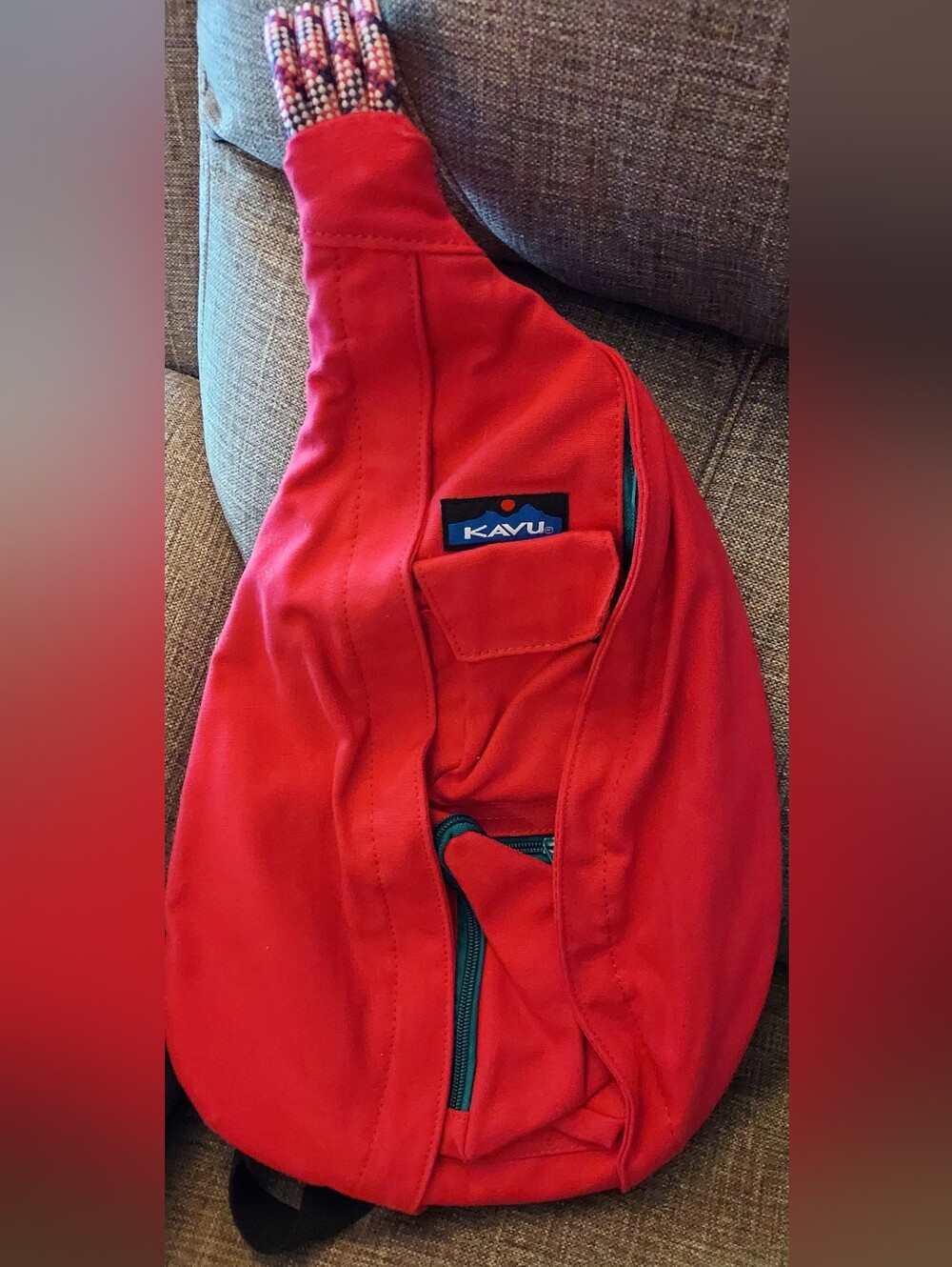 KAVU Red Sling Bag with Teal Zipper Detail